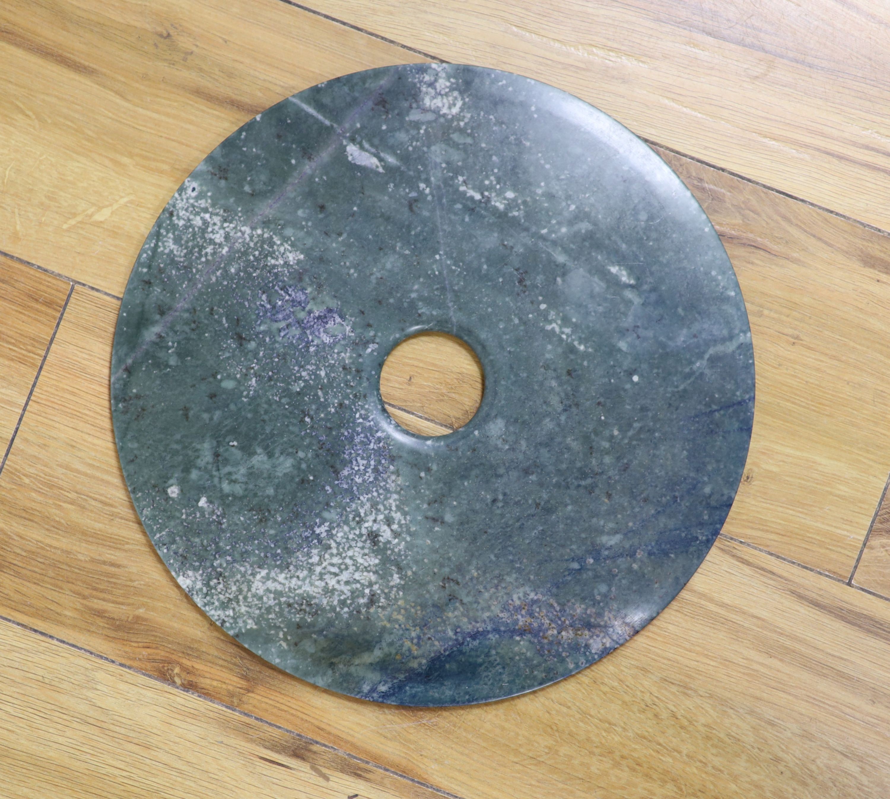 A large Chinese hardstone bi disc 30cm